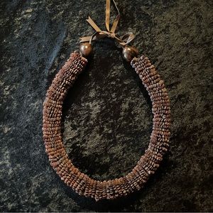 Hawaiian Koa seed dark brown lei.
